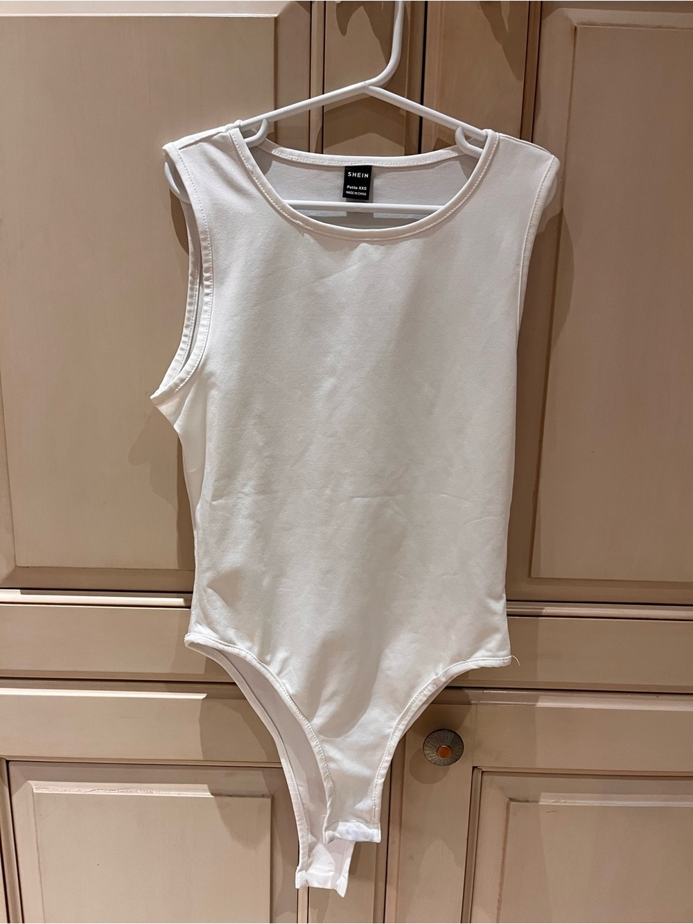 SHEIN white Sleeveless One-Piece Bodysuit